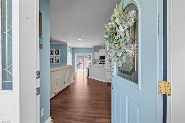 108 Hodges Cove Rd, Yorktown, VA 23692 - foyer with dark wood finished floors, a textured ceiling, and crown molding