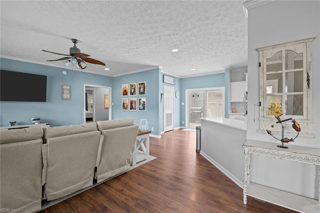 108 Hodges Cove Rd, Yorktown, VA 23692 - living room featuring crown molding, dark wood-type flooring, a ceiling fan, recessed lighting, and a textured ceiling