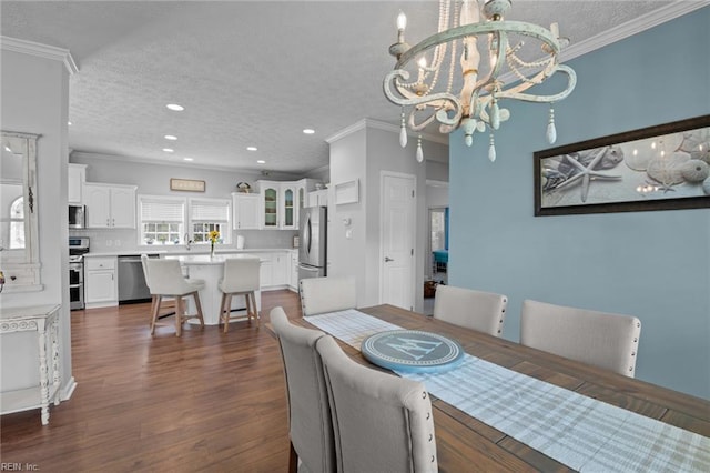 108 Hodges Cove Rd, Yorktown, VA 23692 - dining space featuring a textured ceiling, crown molding, dark wood-style floors, a chandelier, and recessed lighting