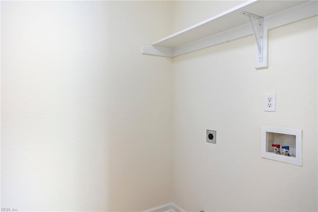 laundry area with laundry area, hookup for a washing machine, baseboards, and electric dryer hookup