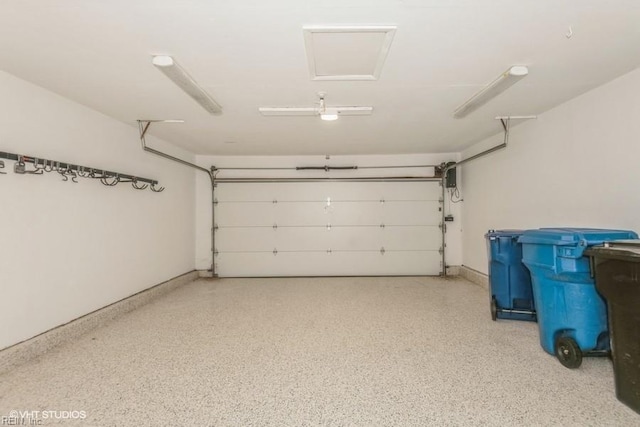 garage featuring baseboards