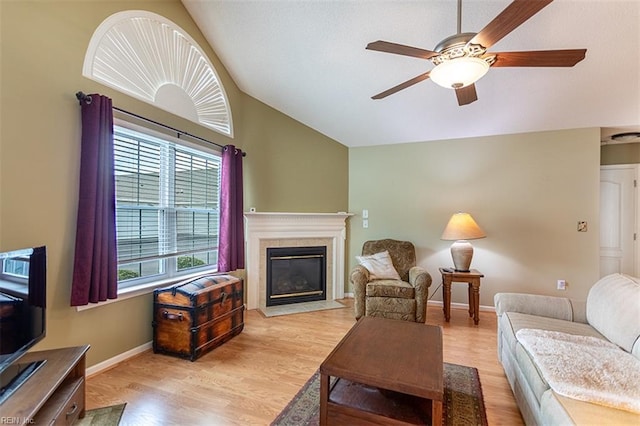 109 Villa Dr, Poquoson, VA 23662 - living area with lofted ceiling, ceiling fan, wood finished floors, a tile fireplace, and baseboards