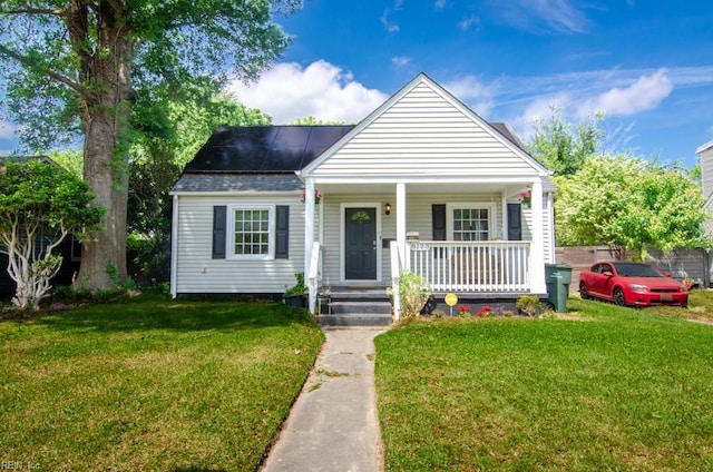 8123 Kenwood Dr, Norfolk, VA 23518 - bungalow with covered porch and a front yard