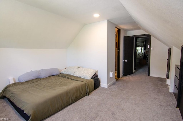 8123 Kenwood Dr, Norfolk, VA 23518 - carpeted bedroom featuring lofted ceiling and baseboards