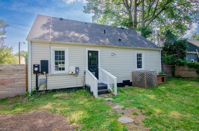 8123 Kenwood Dr, Norfolk, VA 23518 - rear view of house featuring a shingled roof and crawl space