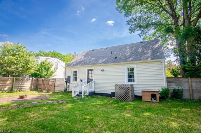 8123 Kenwood Dr, Norfolk, VA 23518 - back of house with a shingled roof