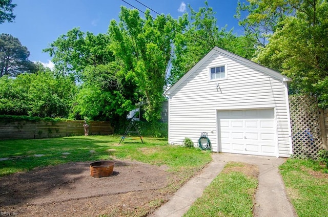 8123 Kenwood Dr, Norfolk, VA 23518 - detached garage featuring driveway
