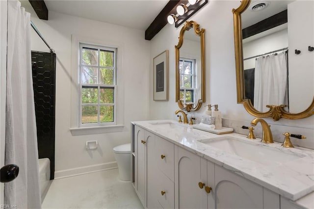 bathroom with a shower with shower curtain, toilet, visible vents, and a sink