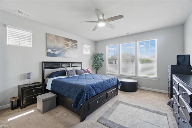 bedroom with visible vents, baseboards, and carpet floors