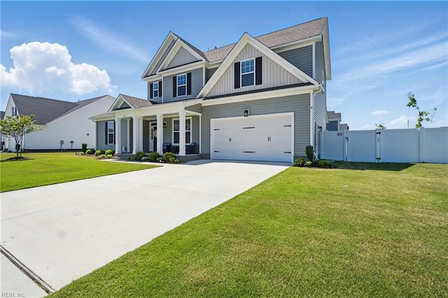 view of front of home featuring a gate, a garage, concrete driveway, board and batten siding, and a porch