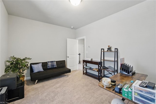 living area featuring carpet flooring