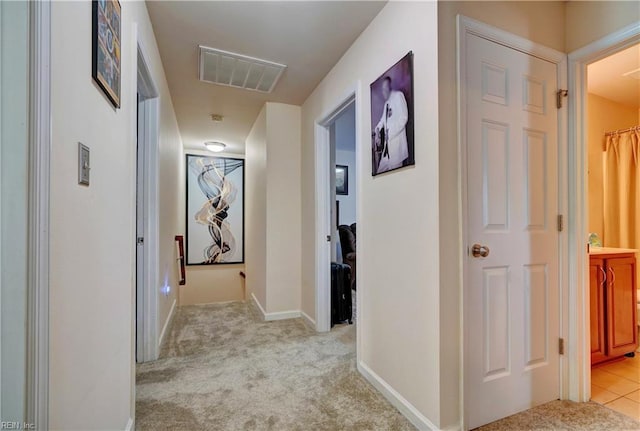 7463 Diven St, Norfolk, VA 23505 - hallway featuring light colored carpet, visible vents, and baseboards