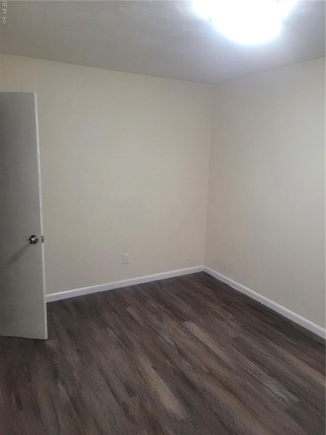 890 Cheyanne Dr, Newport News, VA 23608 - spare room with dark wood-style flooring and baseboards