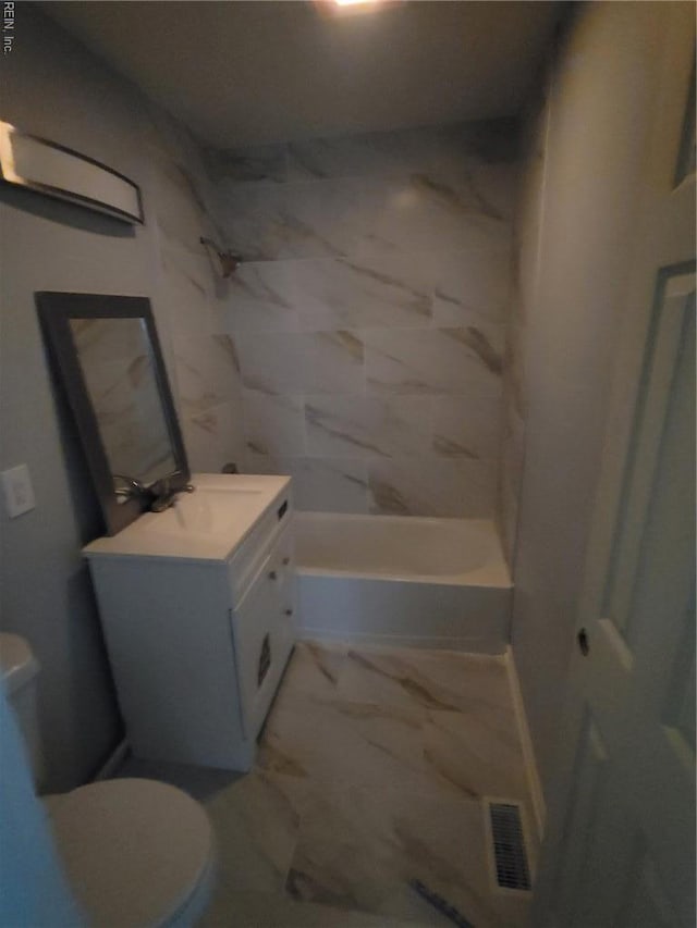 890 Cheyanne Dr, Newport News, VA 23608 - bathroom featuring toilet, marble look tile flooring, vanity, and tub / shower combination