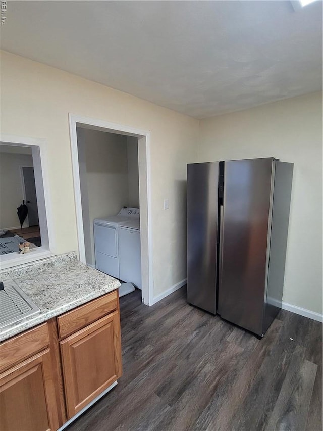 890 Cheyanne Dr, Newport News, VA 23608 - kitchen featuring freestanding refrigerator, dark wood-type flooring, baseboards, brown cabinets, and light stone counters