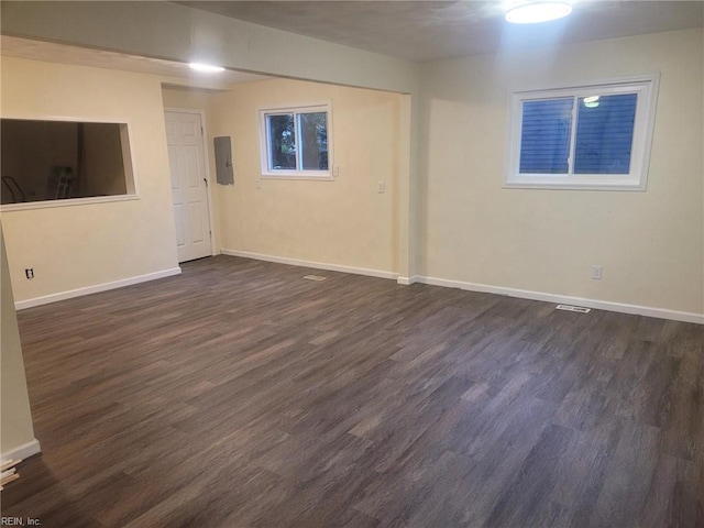 890 Cheyanne Dr, Newport News, VA 23608 - below grade area with dark wood finished floors, baseboards, and electric panel