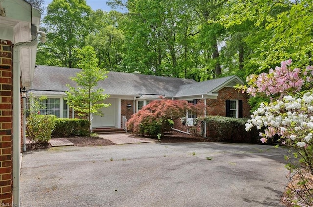 ranch-style home with brick siding