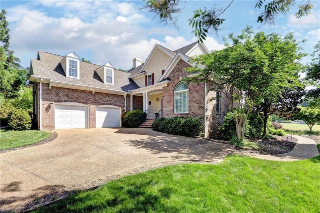 view of front facade featuring brick siding, concrete driveway, a front yard, and a garage