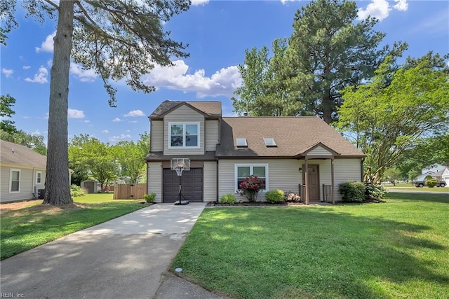 traditional home with driveway, a front yard, and a garage