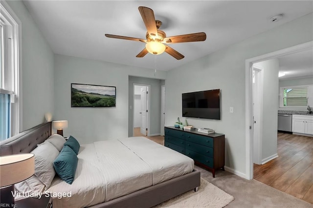 912 W 31st St, Norfolk, VA 23508 - carpeted bedroom featuring baseboards and ceiling fan