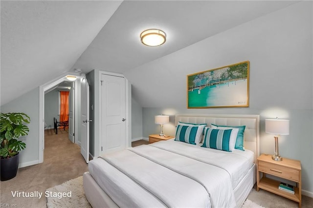 912 W 31st St, Norfolk, VA 23508 - carpeted bedroom with baseboards and lofted ceiling