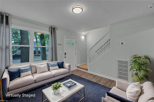 912 W 31st St, Norfolk, VA 23508 - living area featuring stairs, baseboards, visible vents, and wood finished floors