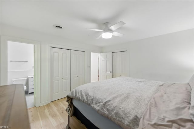 1601 Upton Pl, Suffolk, VA 23433 - bedroom with a ceiling fan, multiple closets, and light wood-style floors
