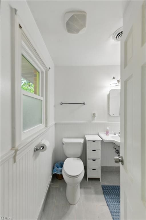 1601 Upton Pl, Suffolk, VA 23433 - bathroom with wainscoting, tile patterned flooring, and toilet