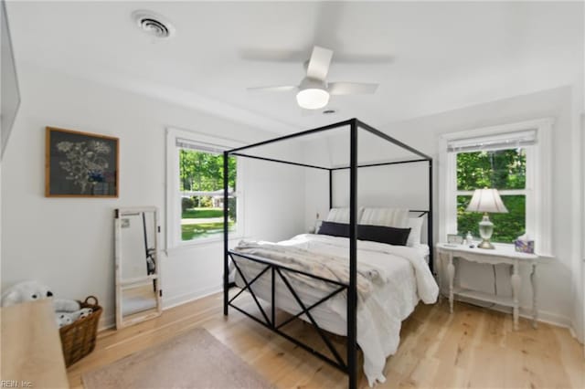 1601 Upton Pl, Suffolk, VA 23433 - bedroom featuring multiple windows, light wood-style floors, and visible vents