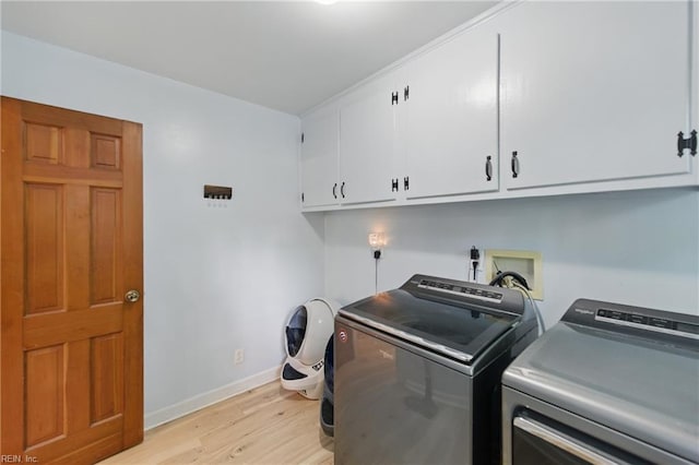 1601 Upton Pl, Suffolk, VA 23433 - laundry room with cabinet space, light wood finished floors, washer and dryer, and baseboards