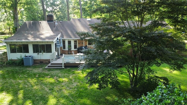 1601 Upton Pl, Suffolk, VA 23433 - back of property featuring central AC unit, a wooden deck, a chimney, and a yard