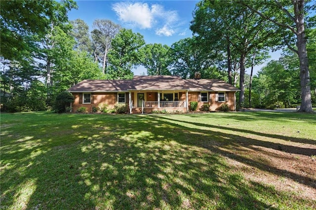 1601 Upton Pl, Suffolk, VA 23433 - single story home featuring covered porch, a chimney, and a front yard