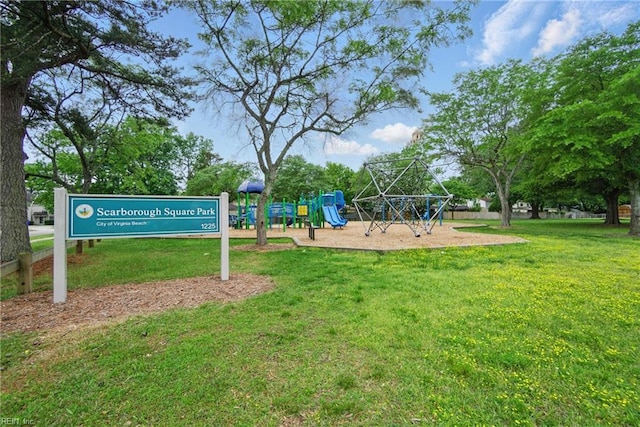 exterior space featuring playground community and a lawn
