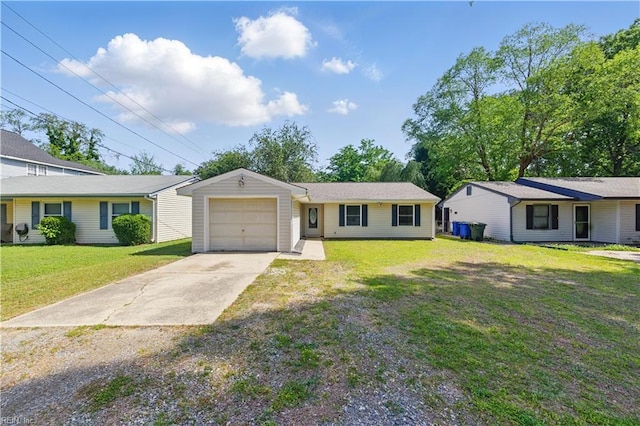 ranch-style house featuring concrete driveway, a front yard, and a garage