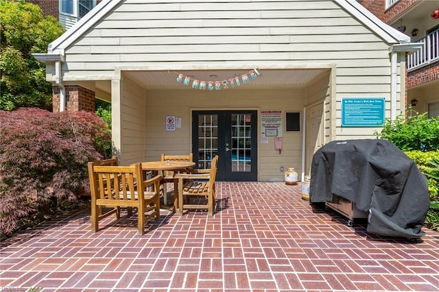 view of patio / terrace with a grill and french doors