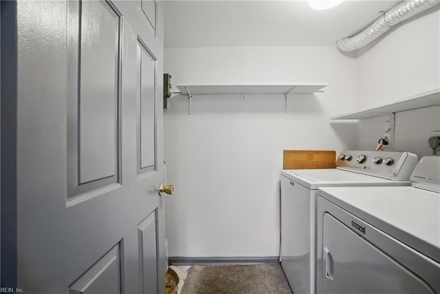 washroom with laundry area and washing machine and dryer
