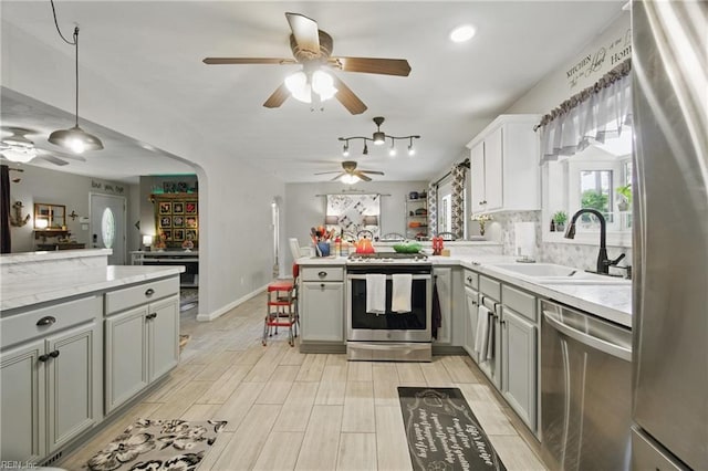 4757 Bunker Hill Ln, Virginia Beach, VA 23462 - kitchen featuring gray cabinets, stainless steel appliances, ceiling fan, and a sink