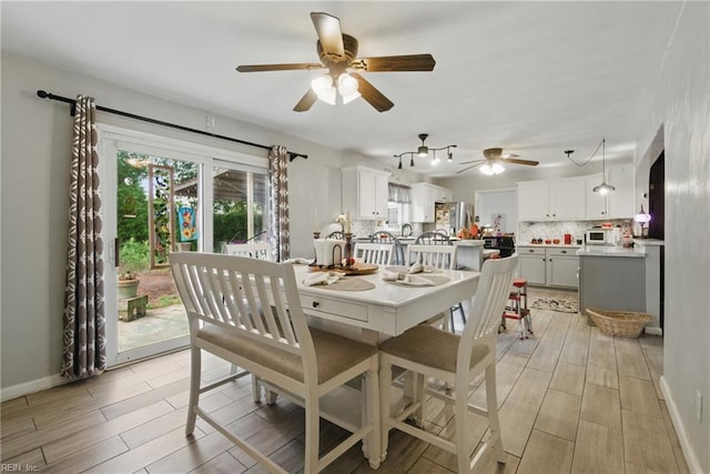 4757 Bunker Hill Ln, Virginia Beach, VA 23462 - dining room featuring light wood-type flooring, baseboards, and ceiling fan