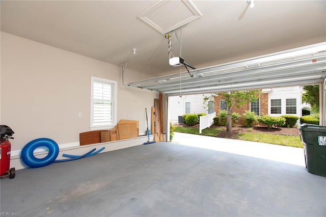 garage featuring a garage door opener