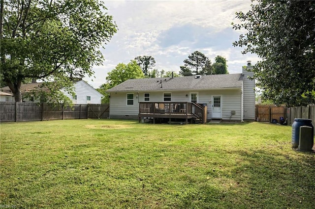 back of house featuring crawl space, a wooden deck, and a chimney