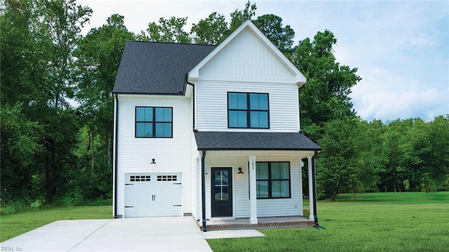 modern farmhouse featuring covered porch, an attached garage, a shingled roof, a front lawn, and driveway