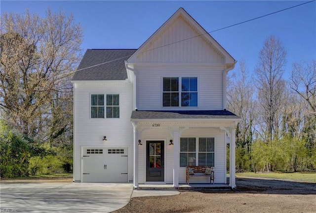 view of front of home featuring concrete driveway, roof with shingles, covered porch, and a garage
