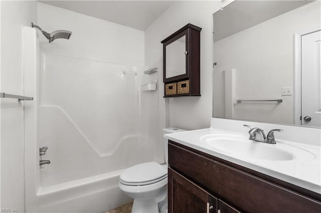 full bathroom featuring toilet, vanity, and bathtub / shower combination