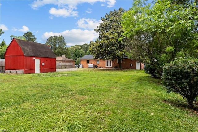 209 Jarvis Rd, Chesapeake, VA 23323 - view of yard featuring an outdoor structure and a barn