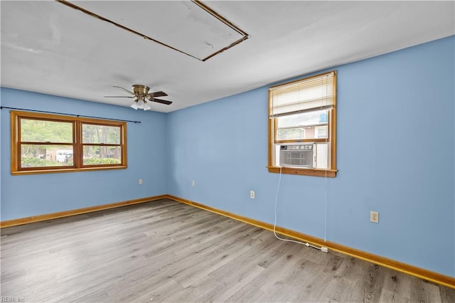 209 Jarvis Rd, Chesapeake, VA 23323 - unfurnished room featuring attic access, cooling unit, wood finished floors, baseboards, and a ceiling fan