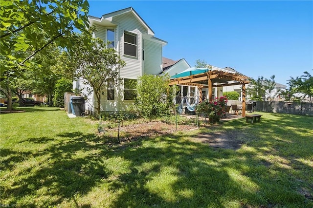 back of property featuring a pergola