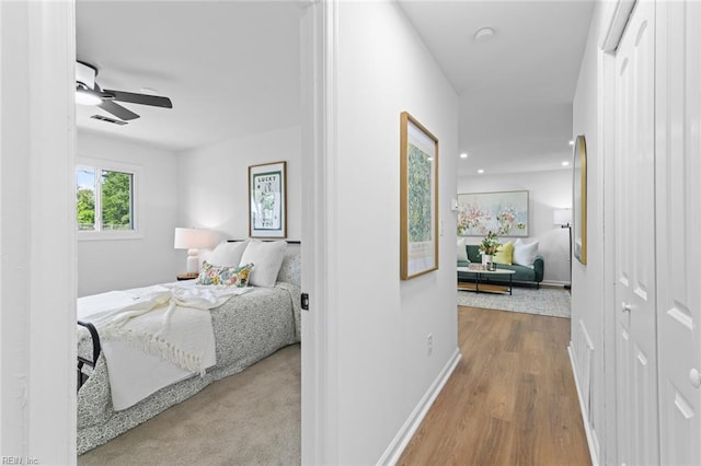 728 23rd St, Newport News, VA 23607 - bedroom with wood finished floors, baseboards, and a ceiling fan