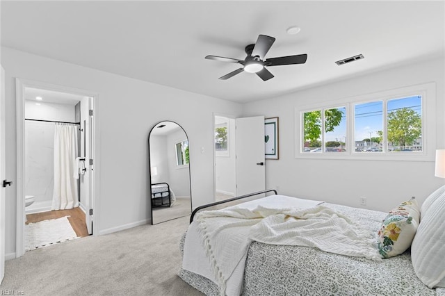 728 23rd St, Newport News, VA 23607 - bedroom featuring baseboards, multiple windows, light carpet, and visible vents