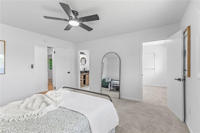 728 23rd St, Newport News, VA 23607 - bedroom with light colored carpet, baseboards, and ceiling fan