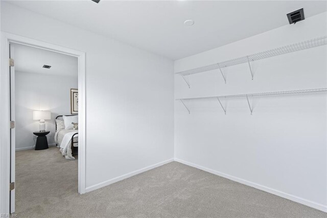 728 23rd St, Newport News, VA 23607 - walk in closet featuring visible vents and carpet floors
